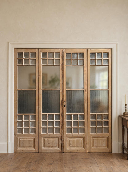 Antique Glass 4 Lite Bi-Fold Doors - 100x95 - N814 shown installed in a room (digital preview)