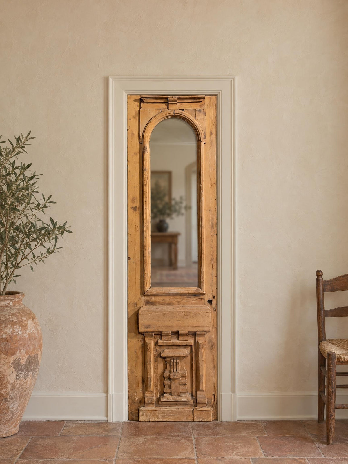 Antique Carved Arched Glass Single Door - 23x91 - N816 shown installed in a room (digital preview)