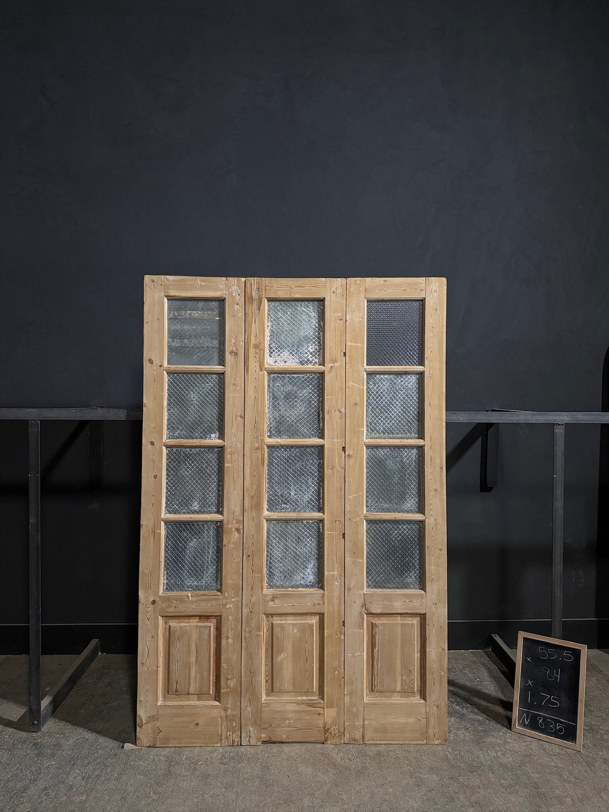 Antique Textured Glass Raised Panel Tri-Fold Doors - 55.5x84 - N835