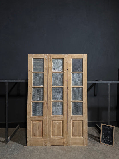 Antique Textured Glass Raised Panel Tri-Fold Doors - 55.5x84 - N835