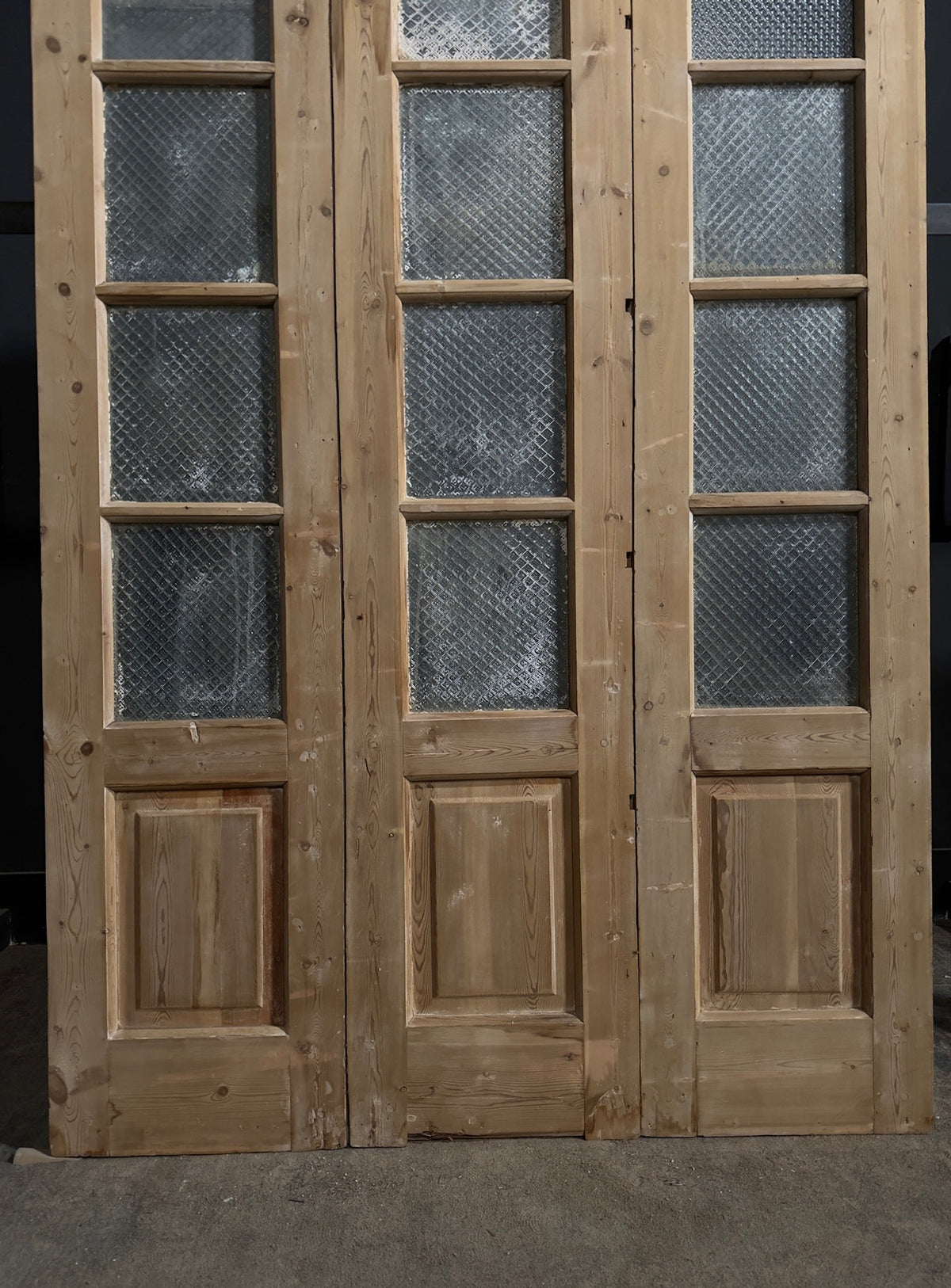 Antique Textured Glass Raised Panel Tri-Fold Doors - 55.5x84 - N835