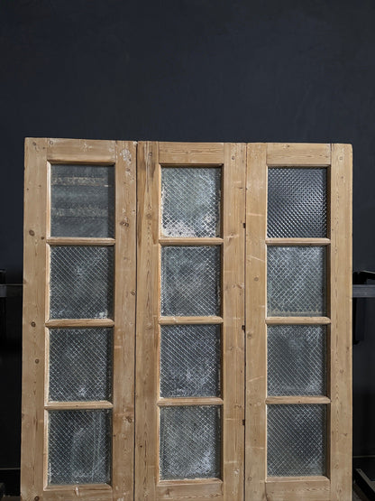 Antique Textured Glass Raised Panel Tri-Fold Doors - 55.5x84 - N835