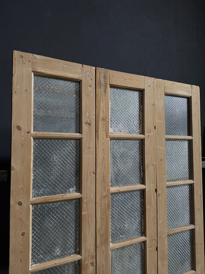 Antique Textured Glass Raised Panel Tri-Fold Doors - 55.5x84 - N835