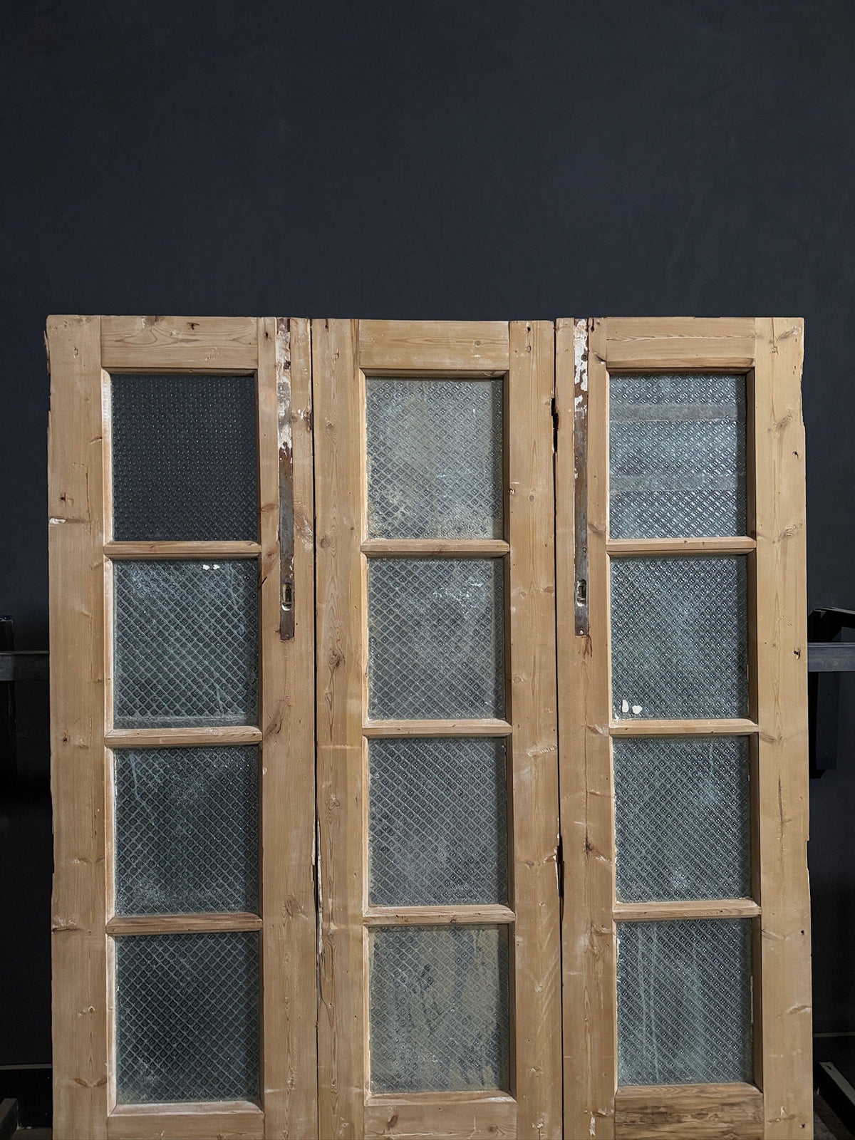 Antique Textured Glass Raised Panel Tri-Fold Doors - 55.5x84 - N835