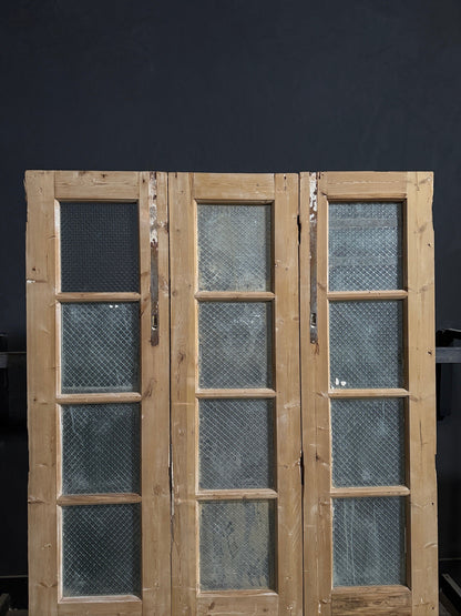 Antique Textured Glass Raised Panel Tri-Fold Doors - 55.5x84 - N835