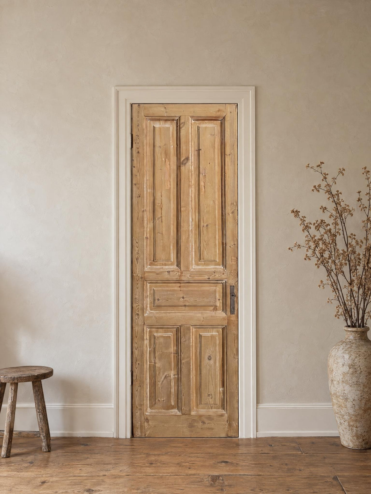 Antique Solid Raised Panel Pantry Door - 28x89 - N848 shown installed in a room (digital preview)