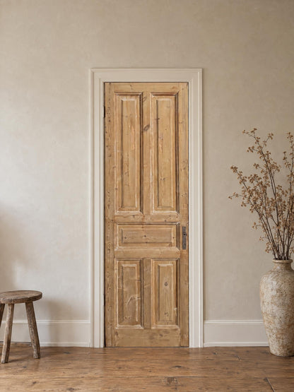 Antique Solid Raised Panel Pantry Door - 28x89 - N848 shown installed in a room (digital preview)