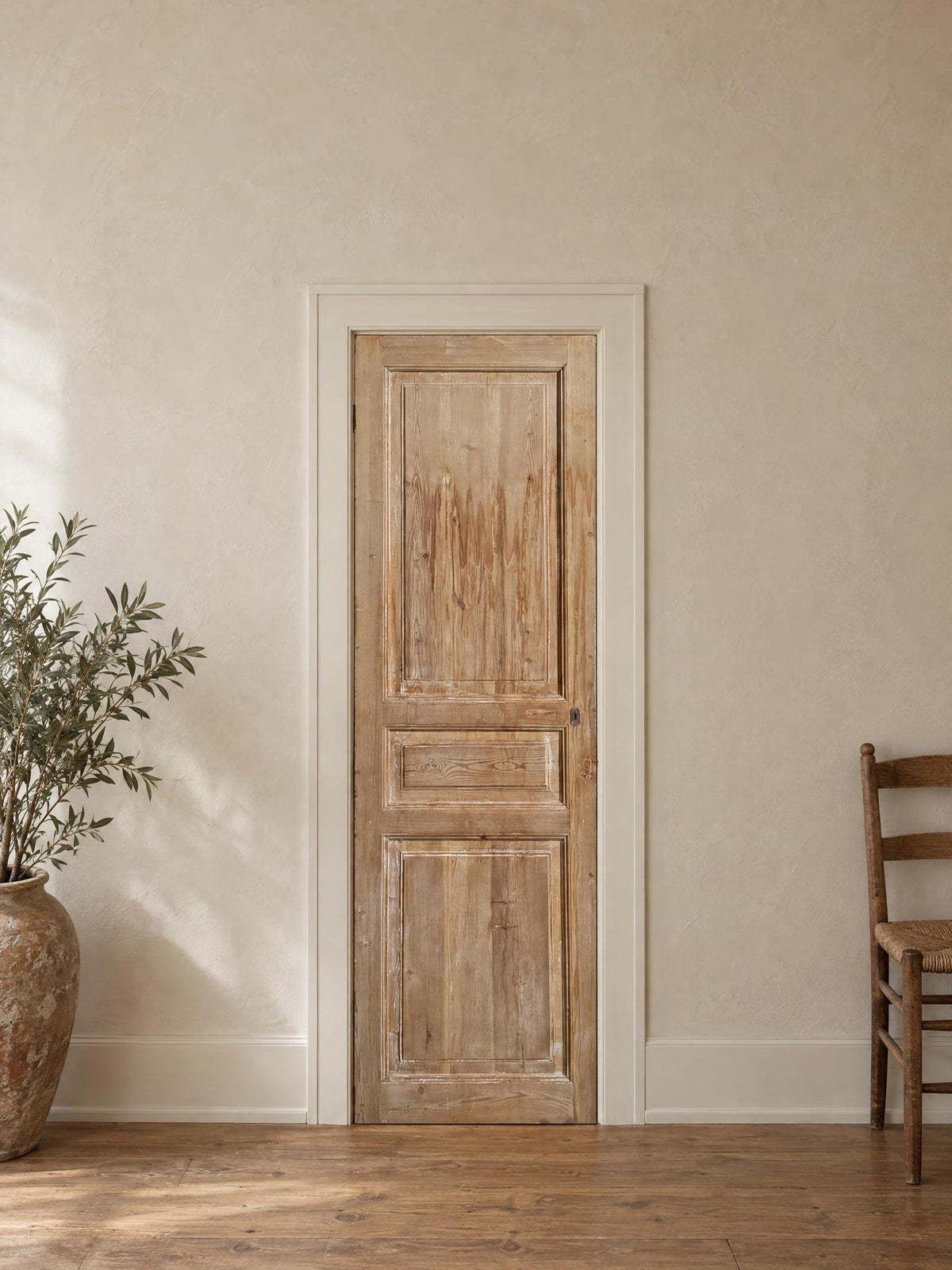 Antique Solid Raised Panel Pantry Door - 28x94 - N849 shown installed in a room (digital preview)